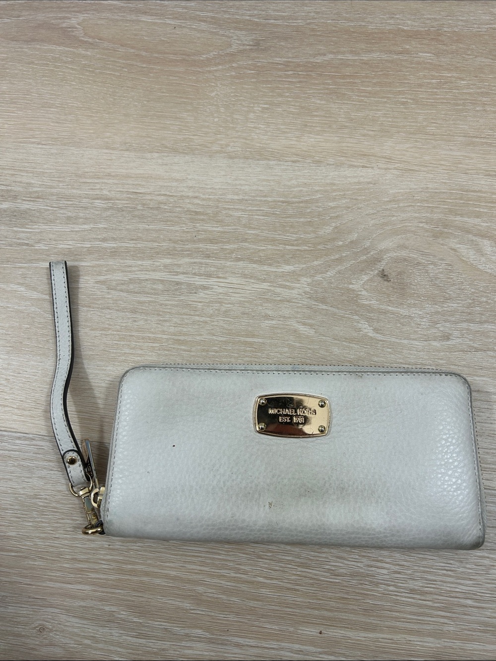 Michael Kors Cream Leather Zip-Around Wristlet with Gold Plaque